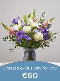 Hand tied bouquet and vase made with seasonal flowers.