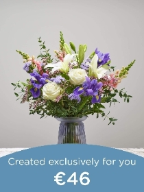 Hand tied bouquet and vase made with seasonal flowers